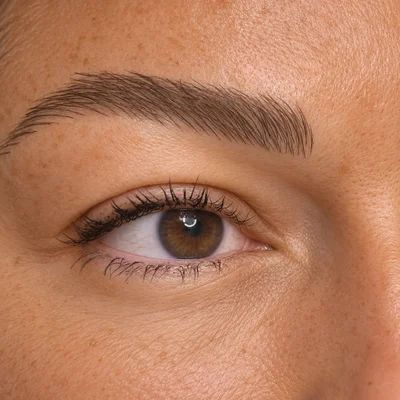 Close-up of microbladed eyebrow hairstrokes